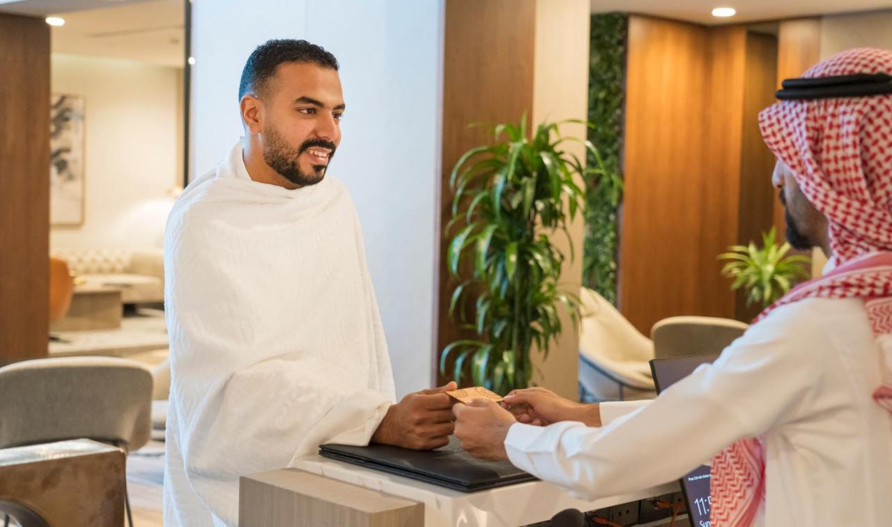 Swissotel Living Cidde Dış mekan fotoğraf A hotel receptionist